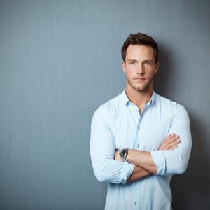 man standing with arms crossed